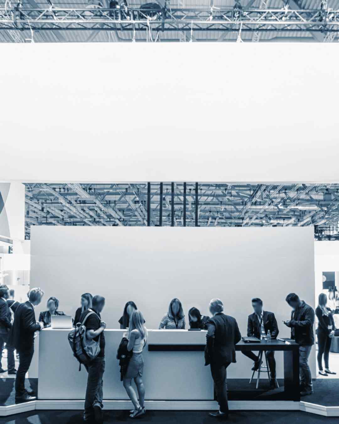 Successful exhibitors at a trade show booth